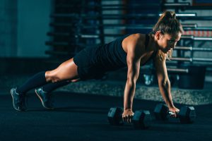 cross-training-young-woman-exercising-at-the-gym.jpg